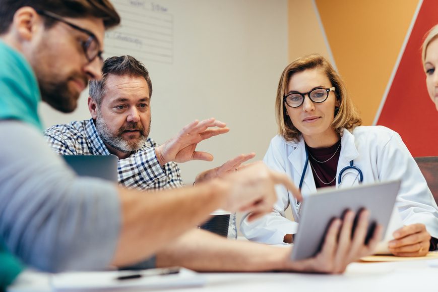 Physician consulting with a recruiting team about an open role